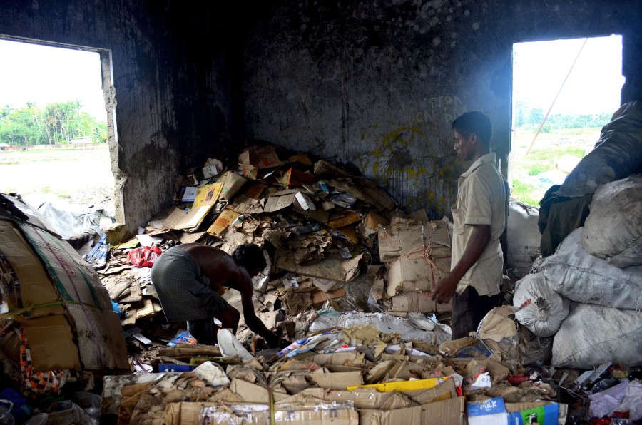Workers at the DMC dumpsite at Sunrise Colony. (Morung File Photo)